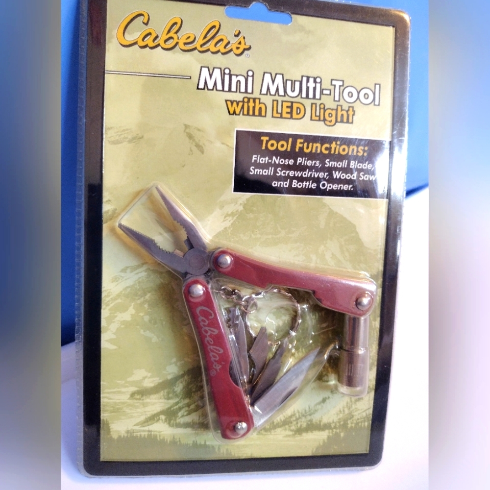 Cabela Mini multi-tool with LED light.